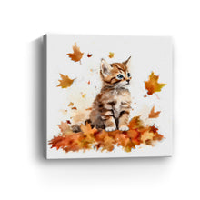 Kitten Among Autumn Leaves