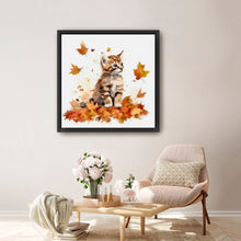 Kitten Among Autumn Leaves