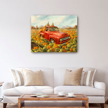 Truck and pumpkin field