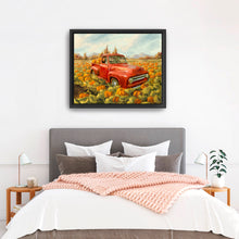 Truck and pumpkin field