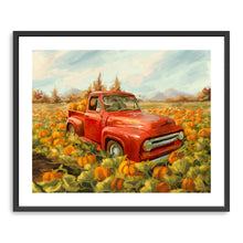 Truck and pumpkin field
